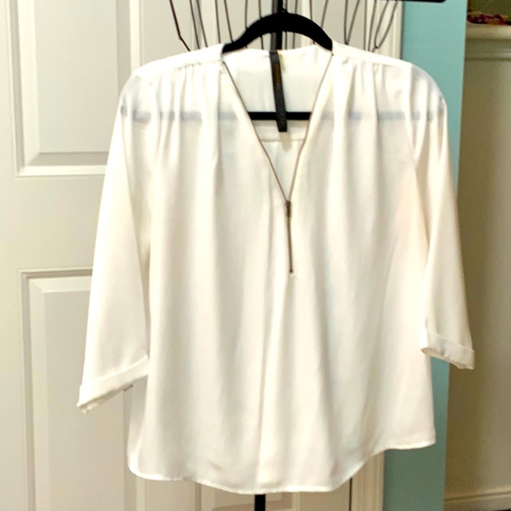 Renee C off-white blouse with zipper neckline